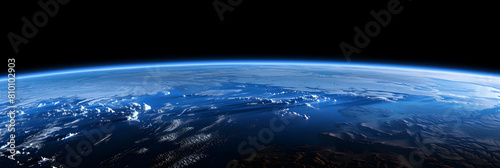 The gradient of Earth's atmosphere transitioning into the blackness of space, as seen from the exosphere with visible layers of atmospheric scattering photo