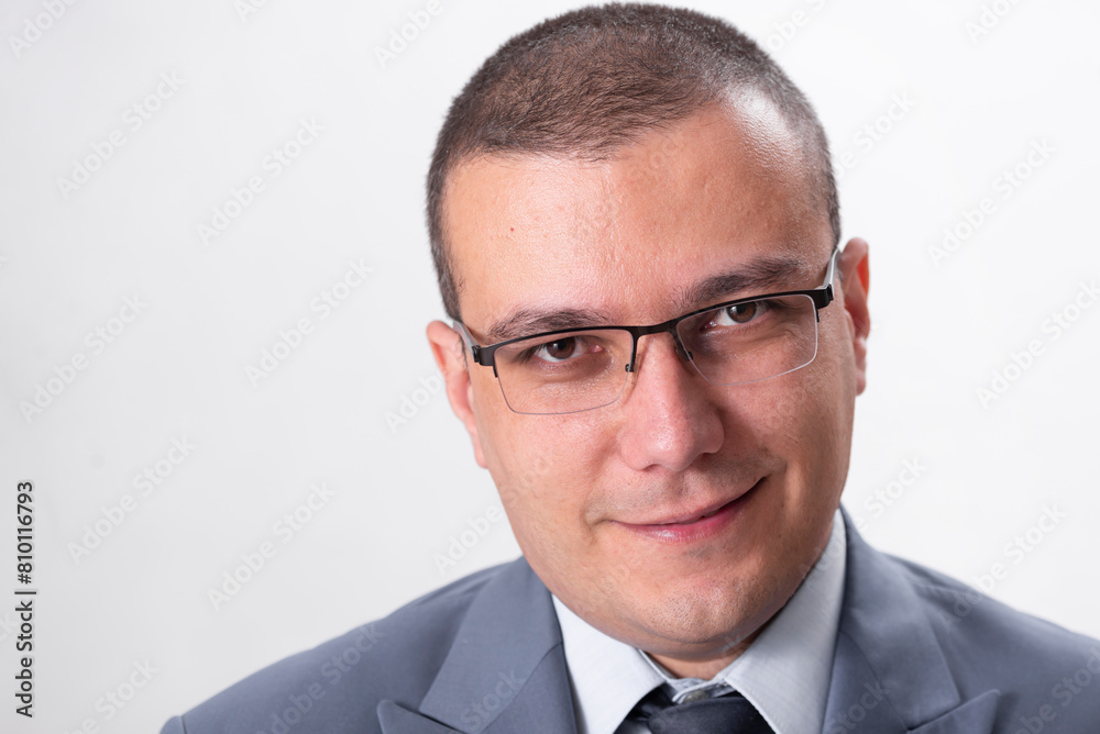 Close-up portrait of cunning businessman isolated on white background Close-up portrait of cunning businessman isolated on white background