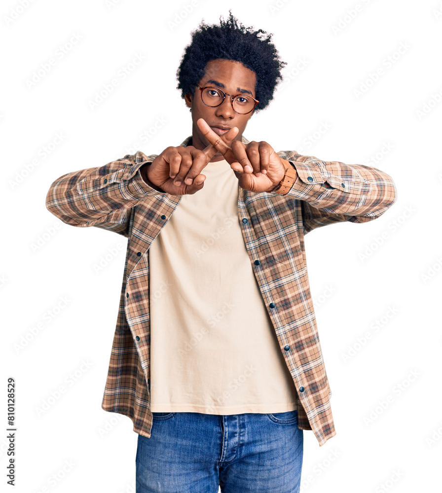 Handsome african american man with afro hair wearing casual clothes and glasses rejection expression crossing fingers doing negative sign Handsome african american man with afro hair wearing casual clothes and glasses rejection expression crossing fingers doing negative sign