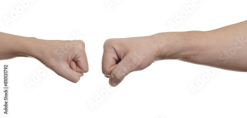 People making fist bump on white background, closeup © New Africa