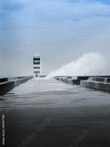 Lighthouse and waves at Atlantic Ocean Porto - Portugal
