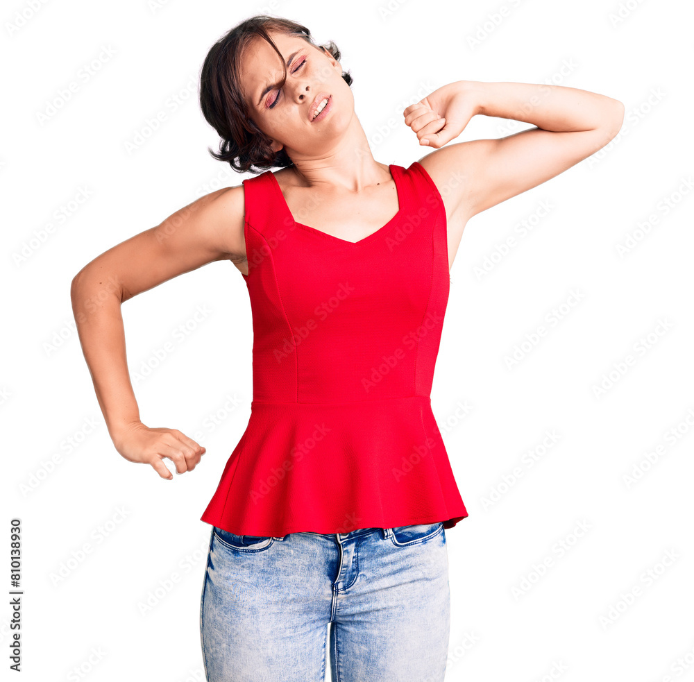Obraz premium Beautiful young woman with short hair wearing casual style with sleeveless shirt stretching back, tired and relaxed, sleepy and yawning for early morning