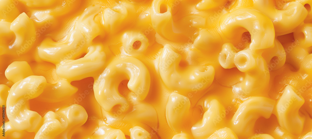 A close-up of creamy macaroni and cheese, tempting with its golden color and velvety texture, promising a delight for the palate. A close-up of creamy macaroni and cheese, tempting with its golden color and velvety texture, promising a delight for the palate.