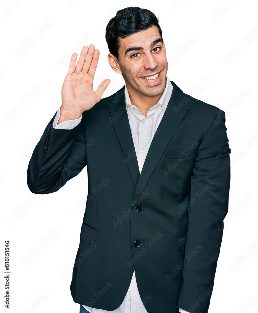 Handsome hispanic man wearing business clothes waiving saying hello happy and smiling, friendly welcome gesture Handsome hispanic man wearing business clothes waiving saying hello happy and smiling, friendly welcome gesture