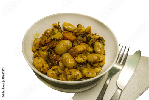 Greek traditional dish - big beans with vegetables on white background