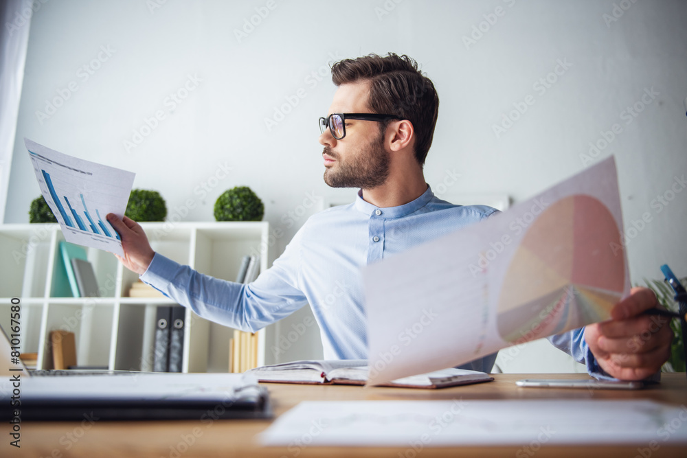 Fototapeta premium Handsome businessman working