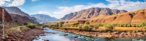 Scenic desert landscape with river and mountains