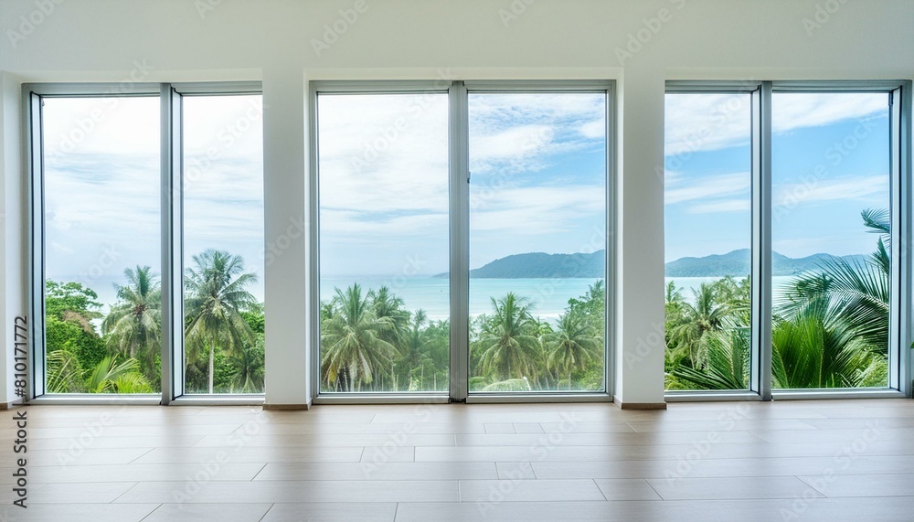 Modern home empty living room interior and panoramic window on tropics Modern home empty living room interior and panoramic window on tropics