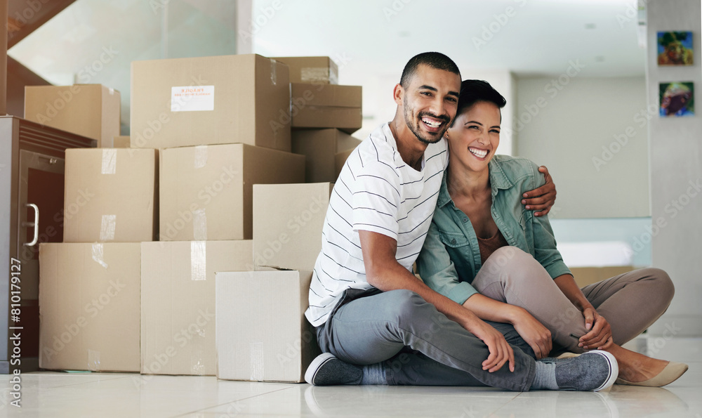 Happy couple, portrait and moving to new home with boxes for property investment, real estate or living room. Man, woman and face for mortgage or house insurance for residential, apartment or loan Happy couple, portrait and moving to new home with boxes for property investment, real estate or living room. Man, woman and face for mortgage or house insurance for residential, apartment or loan