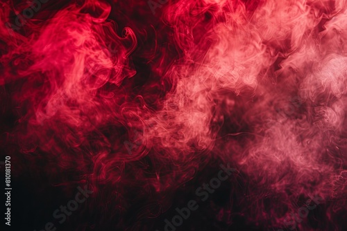 Ethereal red smoke swirls dynamically against a deep  dark backdrop  creating a mysterious and dramatic atmosphere suitable for a variety of creative and artistic applications