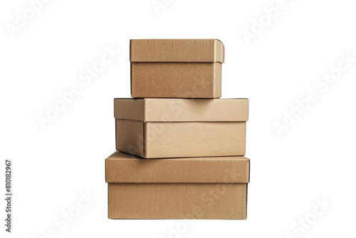 A stack of four brown cardboard boxes of different sizes on a transparent background. © tanapat