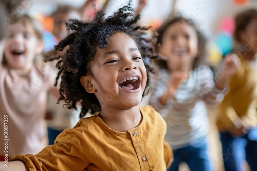 Happy children dancing and singing along to music in a music class