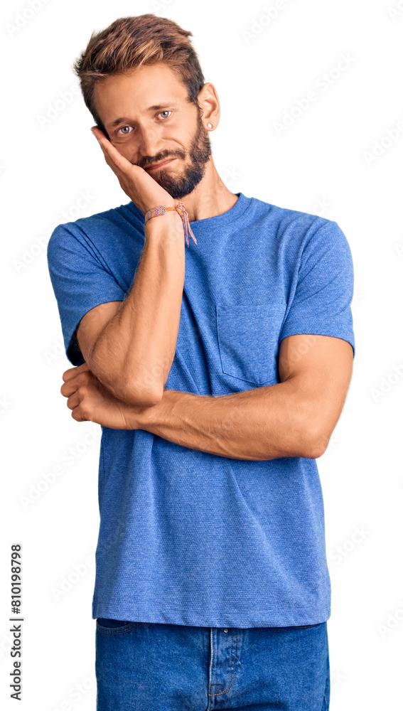 Handsome blond man with beard wearing casual clothes thinking looking tired and bored with depression problems with crossed arms. Handsome blond man with beard wearing casual clothes thinking looking tired and bored with depression problems with crossed arms.