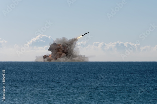 launching a ballistic missile from a warship at sea. Concept: war in Ukraine, missile attack, Russian nuclear threat.