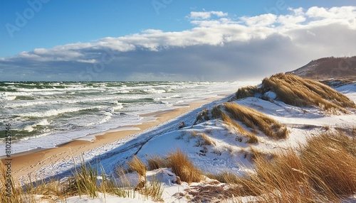 sonniger wintertag am meer dunen am strand sturmische ostsee darss photo