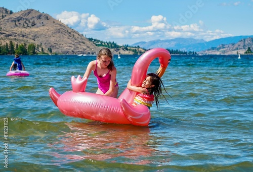 two girls playing in the sea