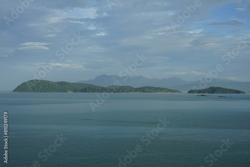 Malaysia, Langkawi, view of the island Pulau Rebak Besar, Kechil and its lush green coastline of Kedawang as seen from a cruise ship photo
