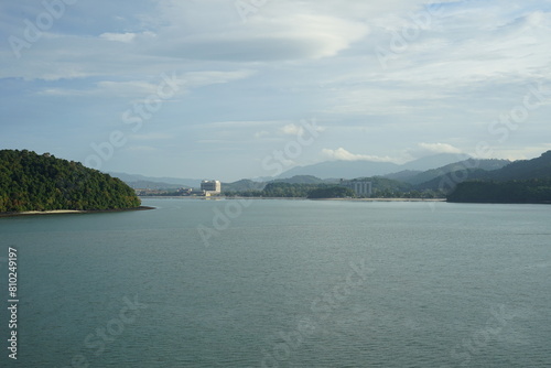 Malaysia, Langkawi, port entrance view of the island Pulau Tepor and the beachfront of Kedawang photo