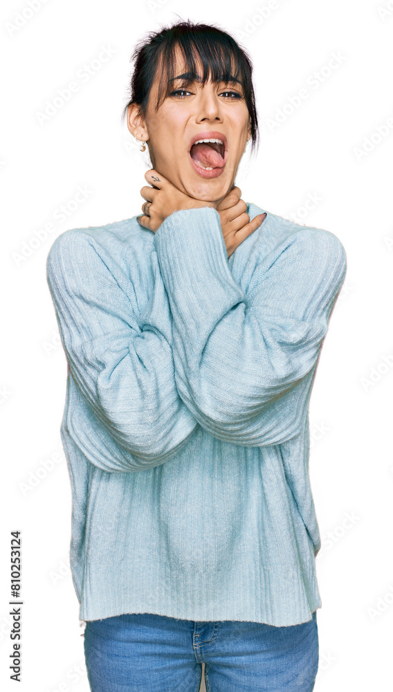Young hispanic woman wearing casual clothes shouting suffocate because painful strangle. health problem. asphyxiate and suicide concept. Young hispanic woman wearing casual clothes shouting suffocate because painful strangle. health problem. asphyxiate and suicide concept.