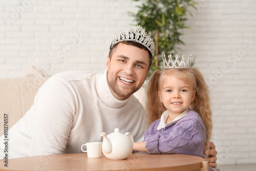 Happy father with his cute ...