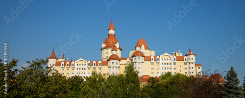 Sochi, Krasnodar Territory, Russia - August 3, 2023: a fabulous castle in Sochi park among green trees on a sunny summer day