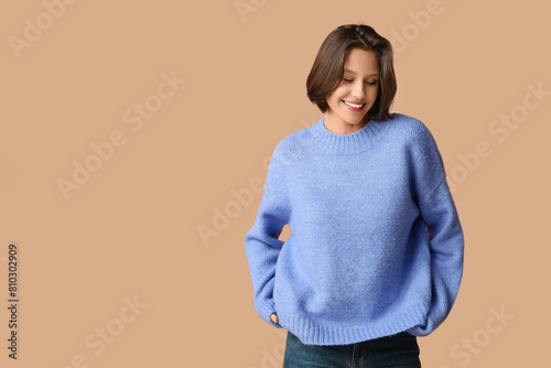 Beautiful young woman in st...