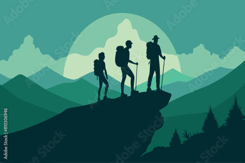 Silhouetted hikers gaze over mountains under a moonlit sky