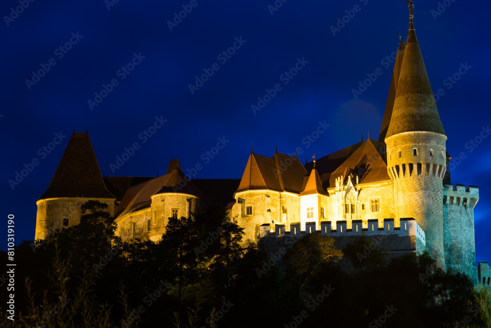 Photo of Corvin Castle which is histirical landmark on sunset of Romania.