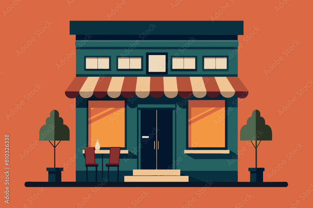 Obraz premium Cozy town cafe with illuminated windows against a dusky sky