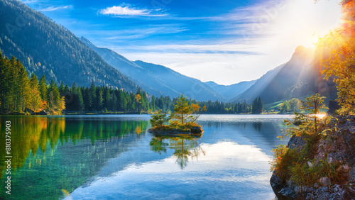 Serene alpine lake at sunrise