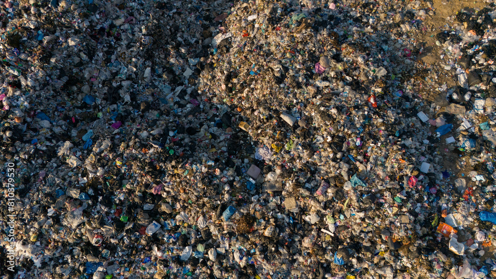 Aerial view of the garbage field (or Landfill) in rural Thailand. It provides a specific place for the disposal of garbage. Aerial view of the garbage field (or Landfill) in rural Thailand. It provides a specific place for the disposal of garbage.