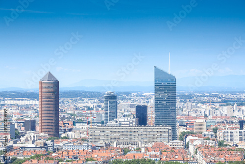 Aerial panoramic view of Lyon with the skyline of Lyon skyscrapers visible in background during a sunny blue sky afternoon. Lyon is the second biggest city of france and a major economic hub.