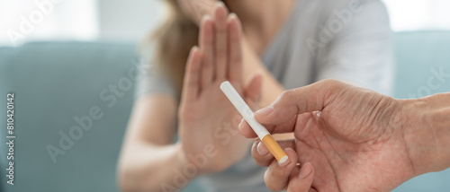 No smoking. Woman stop smoke, refuse, reject, break take cigarette, say no. quit smoking for health. world tobacco day. drugs, Lung Cancer, emphysema , Pulmonary disease, narcotic, nicotine effect photo