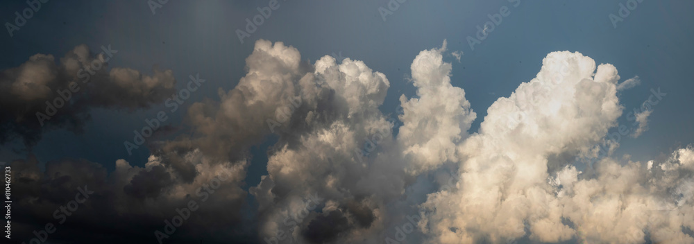 Banner Dramatic dark storm clouds black sky background. Dark thunderstorm clouds rainny season. Panorama Meteorology danger windstorm disasters climate. Dark cloudscape storm cloud with copy space. Banner Dramatic dark storm clouds black sky background. Dark thunderstorm clouds rainny season. Panorama Meteorology danger windstorm disasters climate. Dark cloudscape storm cloud with copy space.