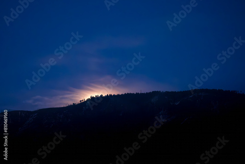 Tableau sur toile background moonrise over Catalina mountains Arizona