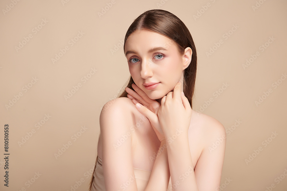 Beautiful young woman with clean fresh skin on beige background, Face care, Facial treatment, Cosmetology, beauty and spa, women portrait. Beautiful young woman with clean fresh skin on beige background, Face care, Facial treatment, Cosmetology, beauty and spa, women portrait.