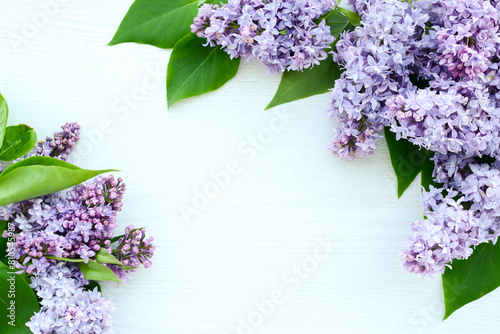 Lilac flowers on white wooden background. Spring flowers. Beautiful Floral background for Birthday  Spring Holiday  Mother s day  Women s day  Wedding. Flat lay  top view  copy space
