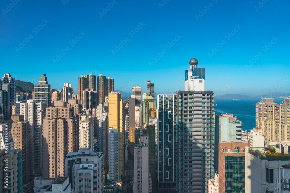 City top view of skyscrapers building Hong Kong city, cityscape flying above. development buildings, Residential area of the city