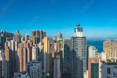 City top view of skyscrapers building Hong Kong city  cityscape flying above. development buildings  Residential area of the city