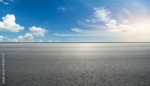 Empty asphalt floor with blue sky . © Verdiana