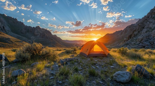 The Camping tent in the mountain valley can see sunrise in the morning.