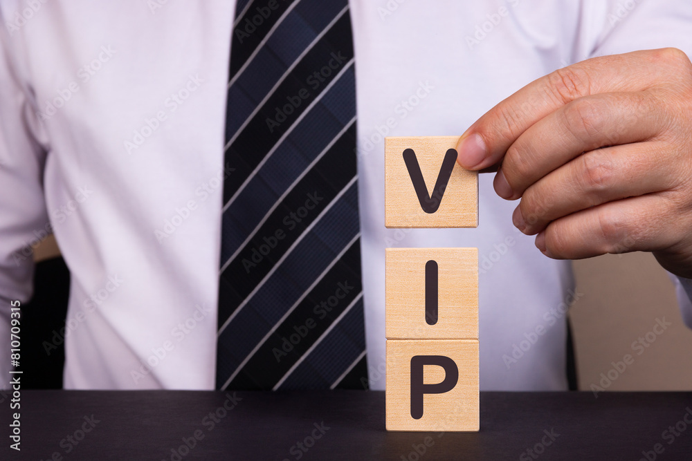 Man made word VIP with wood blocks Man made word VIP with wood blocks
