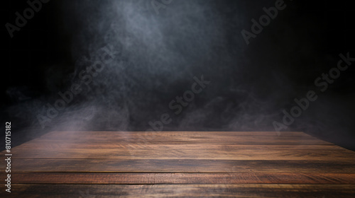 empty wooden table with smoke float up on dark background