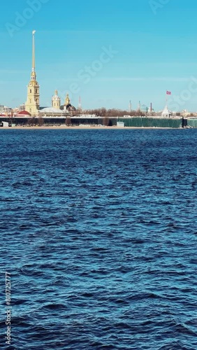 St. Petersburg, Russia - April 20, 2024. View of the sights of the city from the Neva River embankment. Panoramic view of the Neva River and Peter and Paul Fortress, on Zayachy Island. 4К