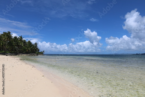 Kawhagan island view surrounded by turquoise water as a second stop of Island Hopping tour in Siargao © Tom