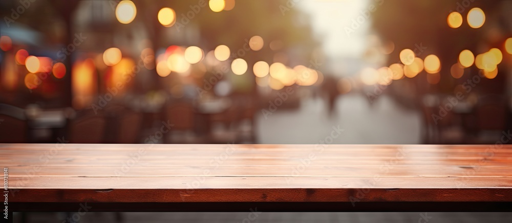 Table top with a blurred restaurant in the background creating an ideal copy space image