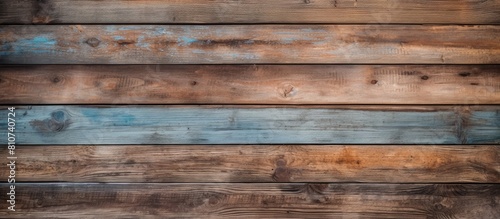 Shabby wooden boards create an abstract background with texture in this photo providing ample copy space photo