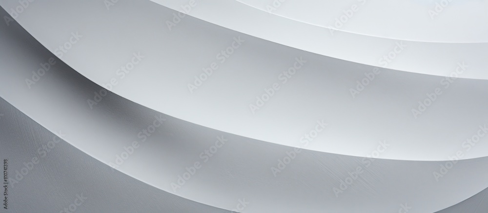 A gray paper background with ample space for your creative adornments and design elements A gray paper background with ample space for your creative adornments and design elements