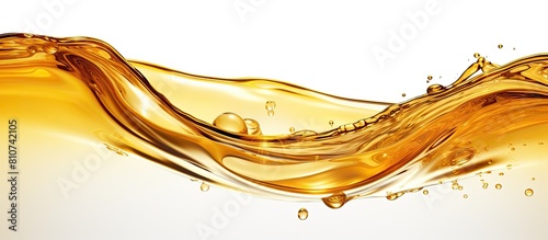 A stunning image of glistening golden oil with captivating ripples and sparkling bubbles that is set against a clean white background perfect for copy space