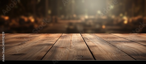 Blurred military technology background with bullet marks on wood providing ample copy space for text